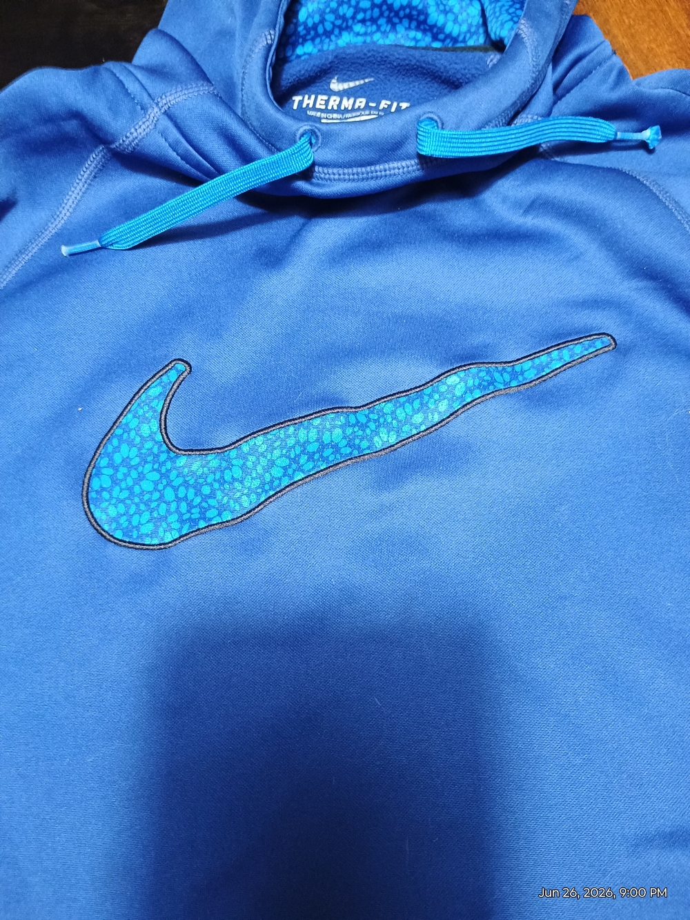 Nike Blue Pullover Hoodie with Patterned Swoosh